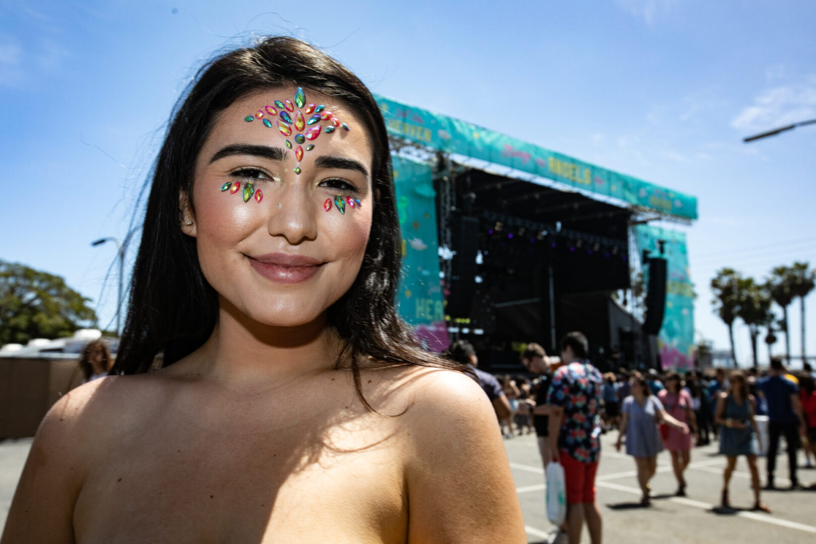 Woman with face stickers at concert