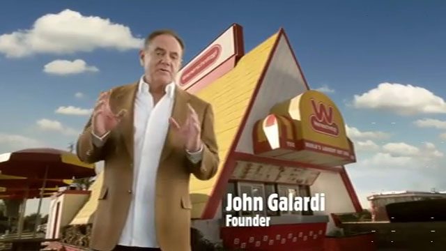 John Galardi talking outside a wienerschnitzel